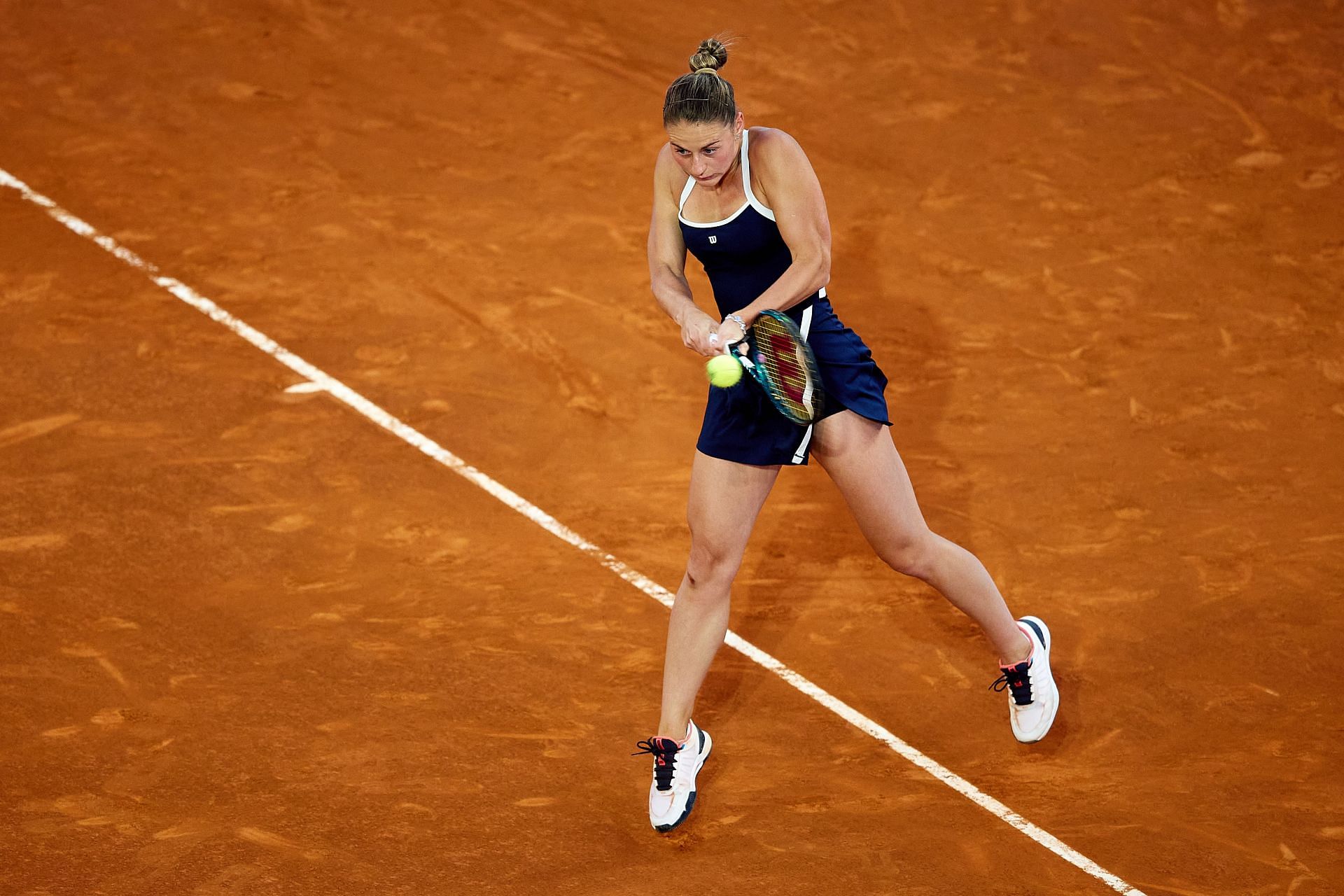 Kostyuk in action at the Mutua Madrid Open - Day Nine - Source: Getty